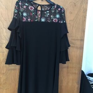 Black holiday dress with embroidered top